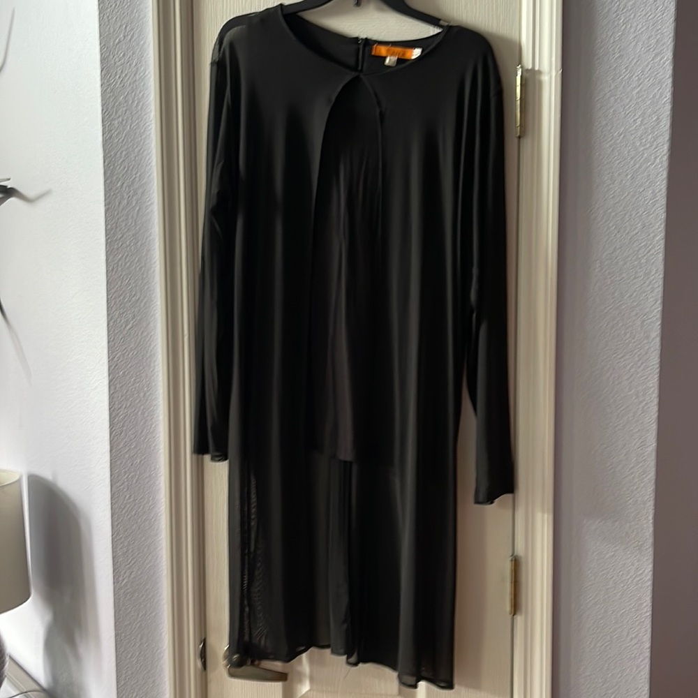 Ladies black shell with see-through overlay